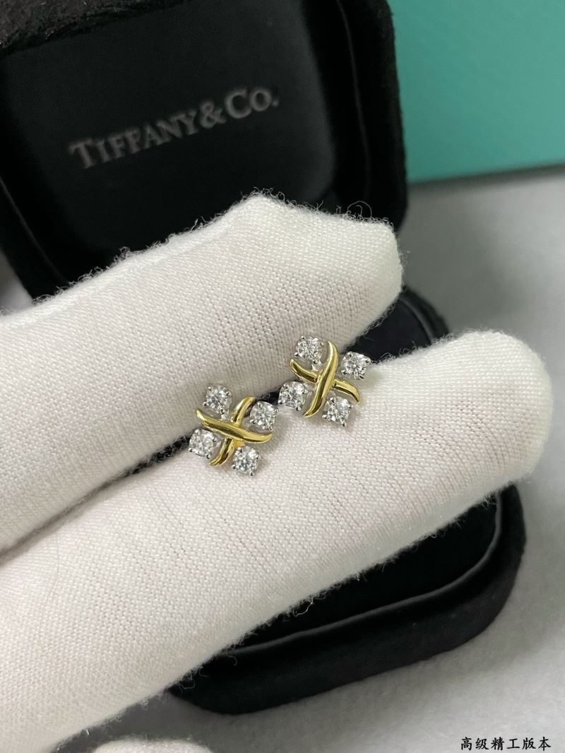 T*f*ny earrings